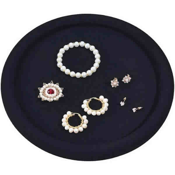 Jewellery styled on velvet tray